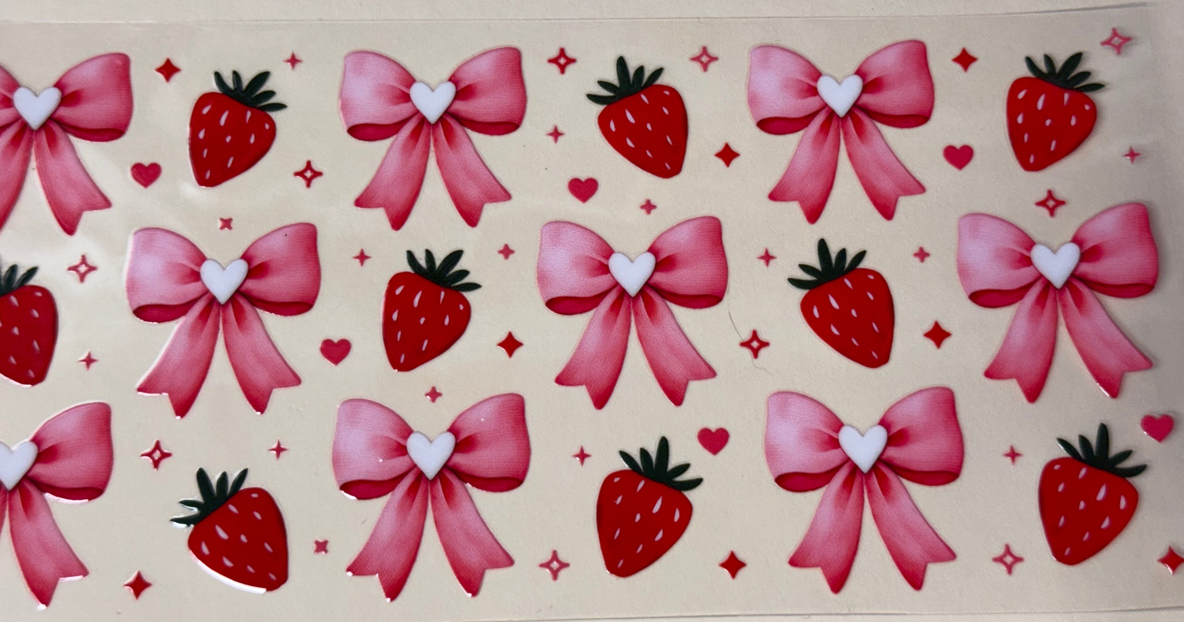 strawberries with pink bows