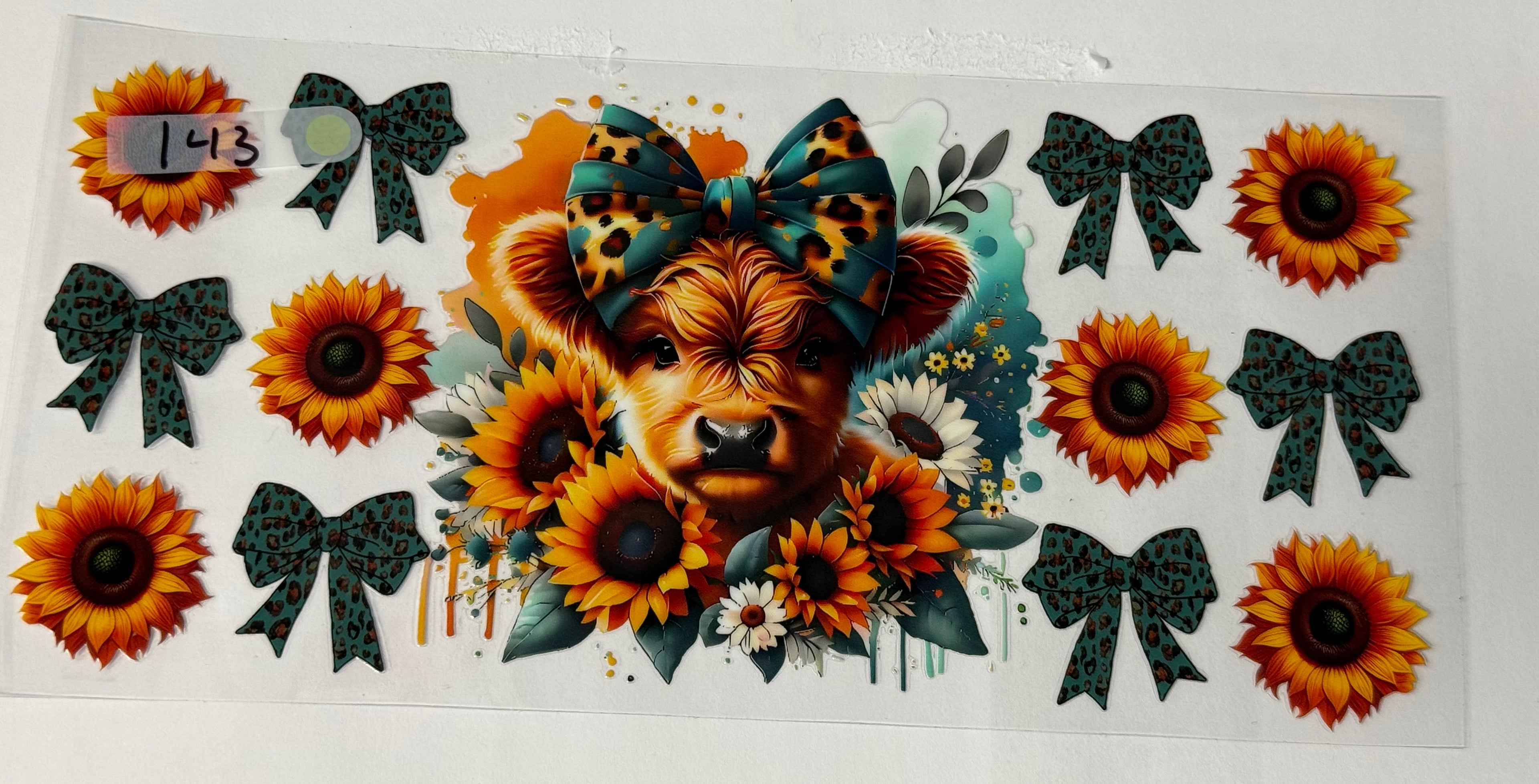 Teal cow with sunflower