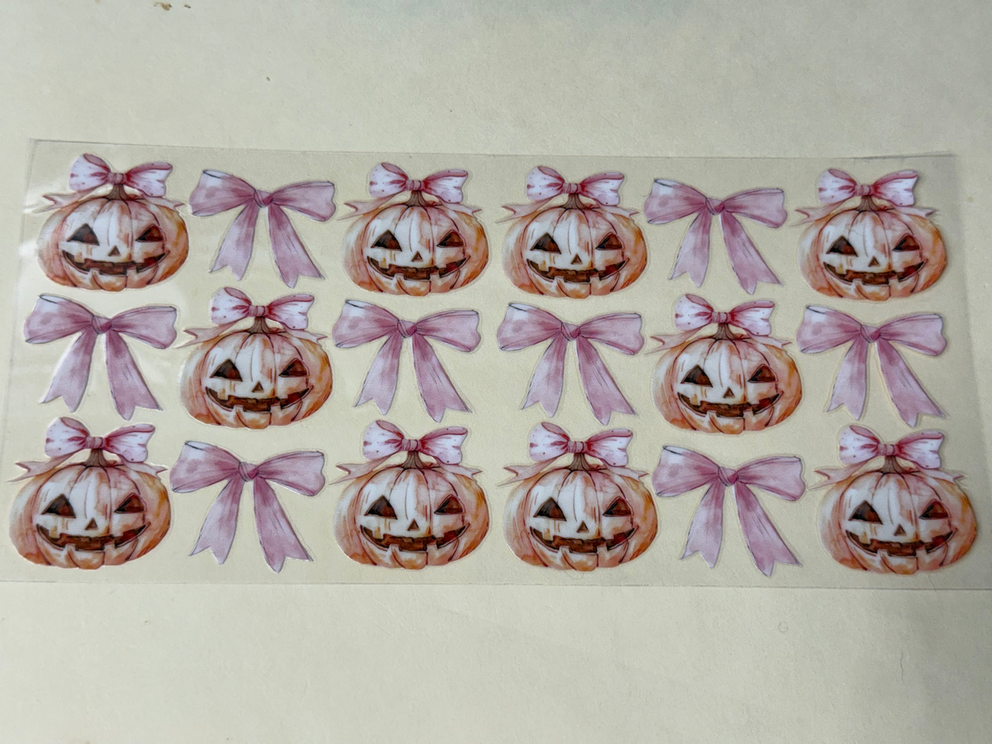 halloween pumpkin with pink bows