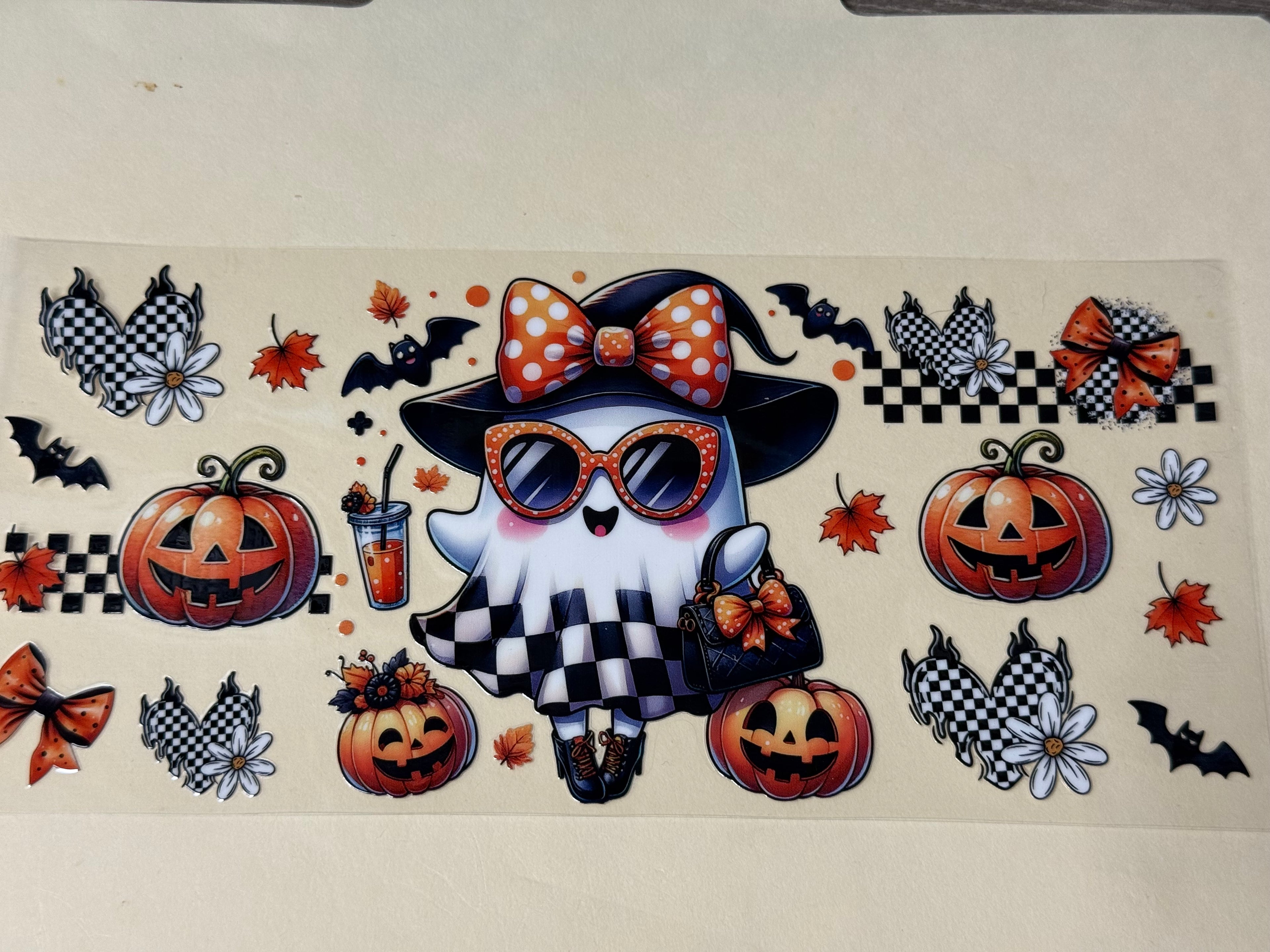 checkered ghost with pumpkins